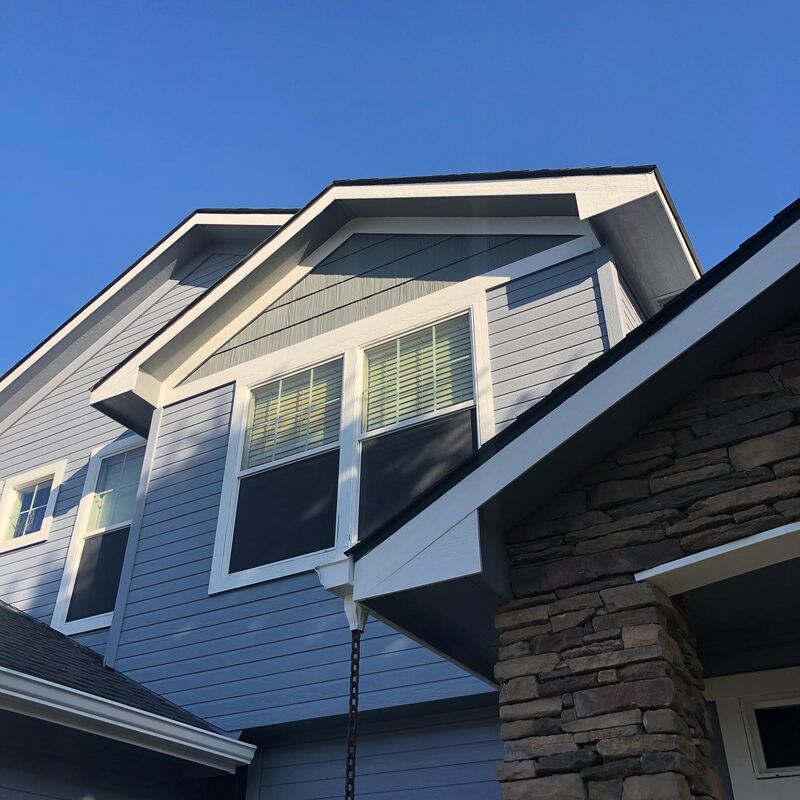 Exterior house painting - upper gable and siding